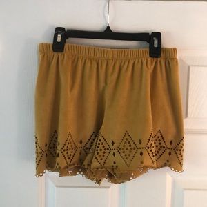 Mustard color shorts with cutouts